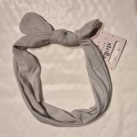 Ljusgrått hårband