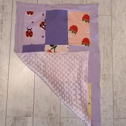 Lapptäcksfilt i trikå till baby