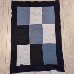 Lapptäcksfilt i trikå till baby