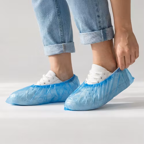 Kertakäyttöiset kenkäsuojat (100 kpl)