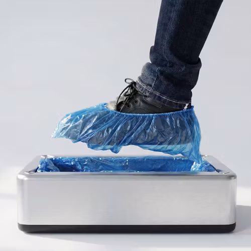 Kengänsuoja-automaatti (+100 suojapussia)