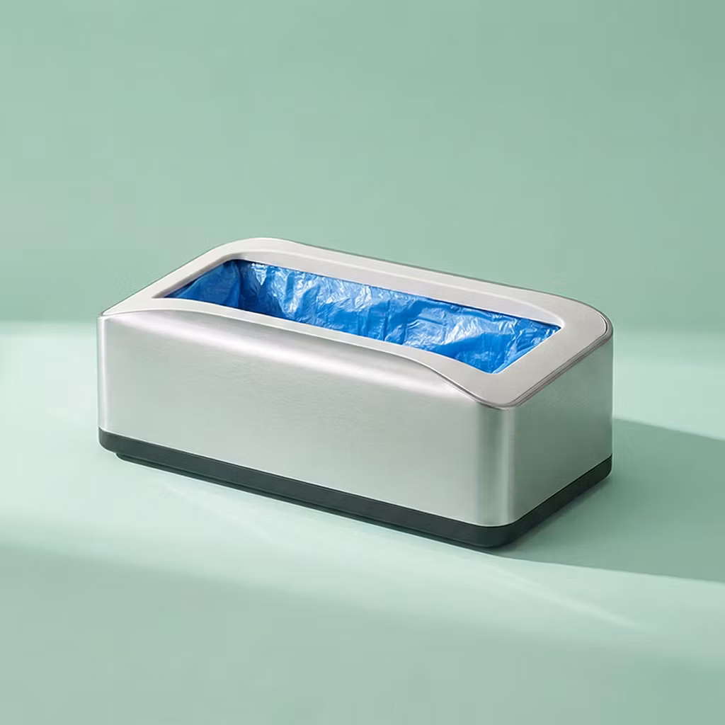 Kengänsuoja-automaatti (+100 suojapussia)