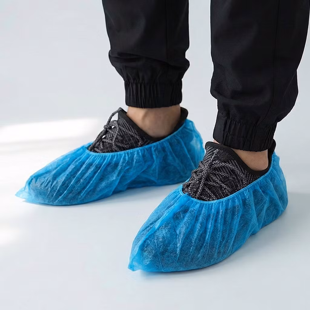 Kertakäyttöiset Kengänsuojat (100 kpl)