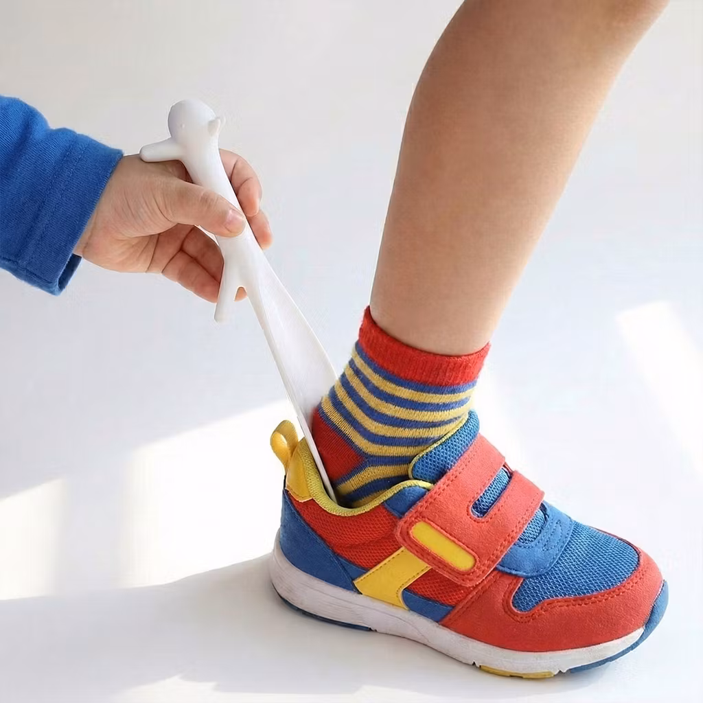 Design-kenkälusikka (orava-aihe)