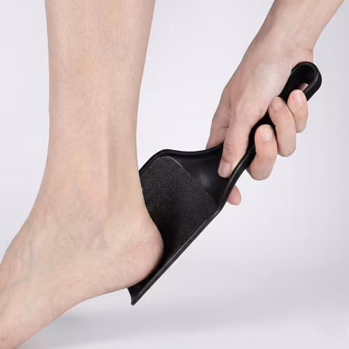 Ergonominen jalkaraspi kantapäille