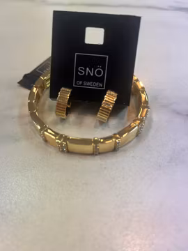Snö armband och örhänge guld