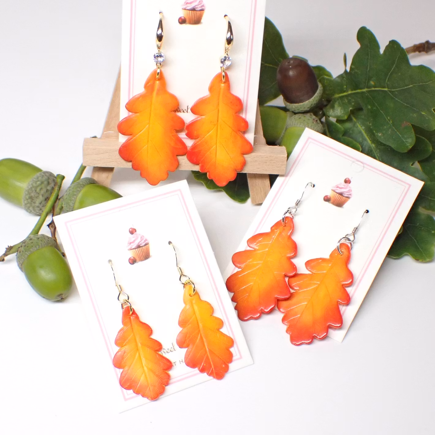 Eklöv örhängen 28 mm silver/guld