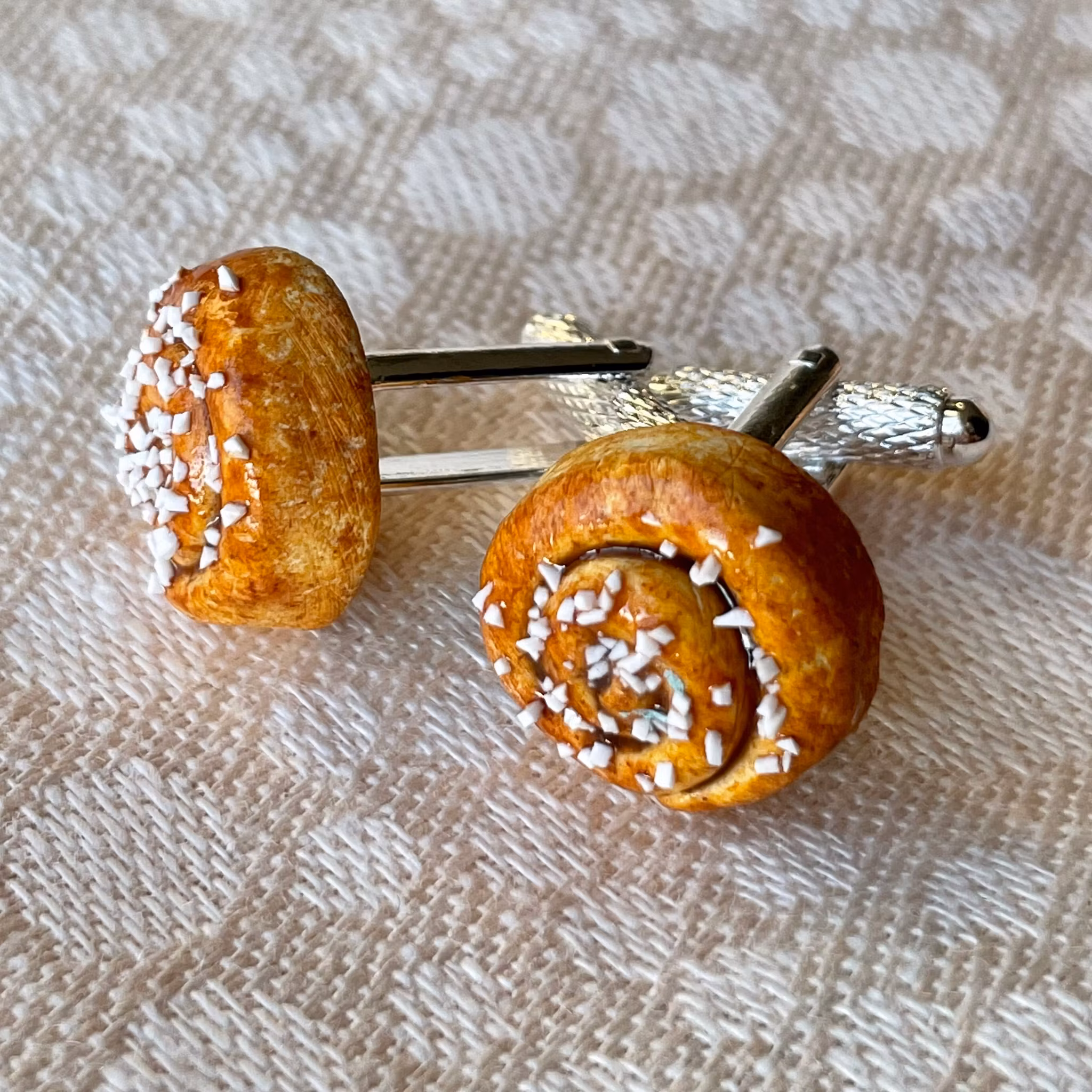 Kanelbulle manschettknappar