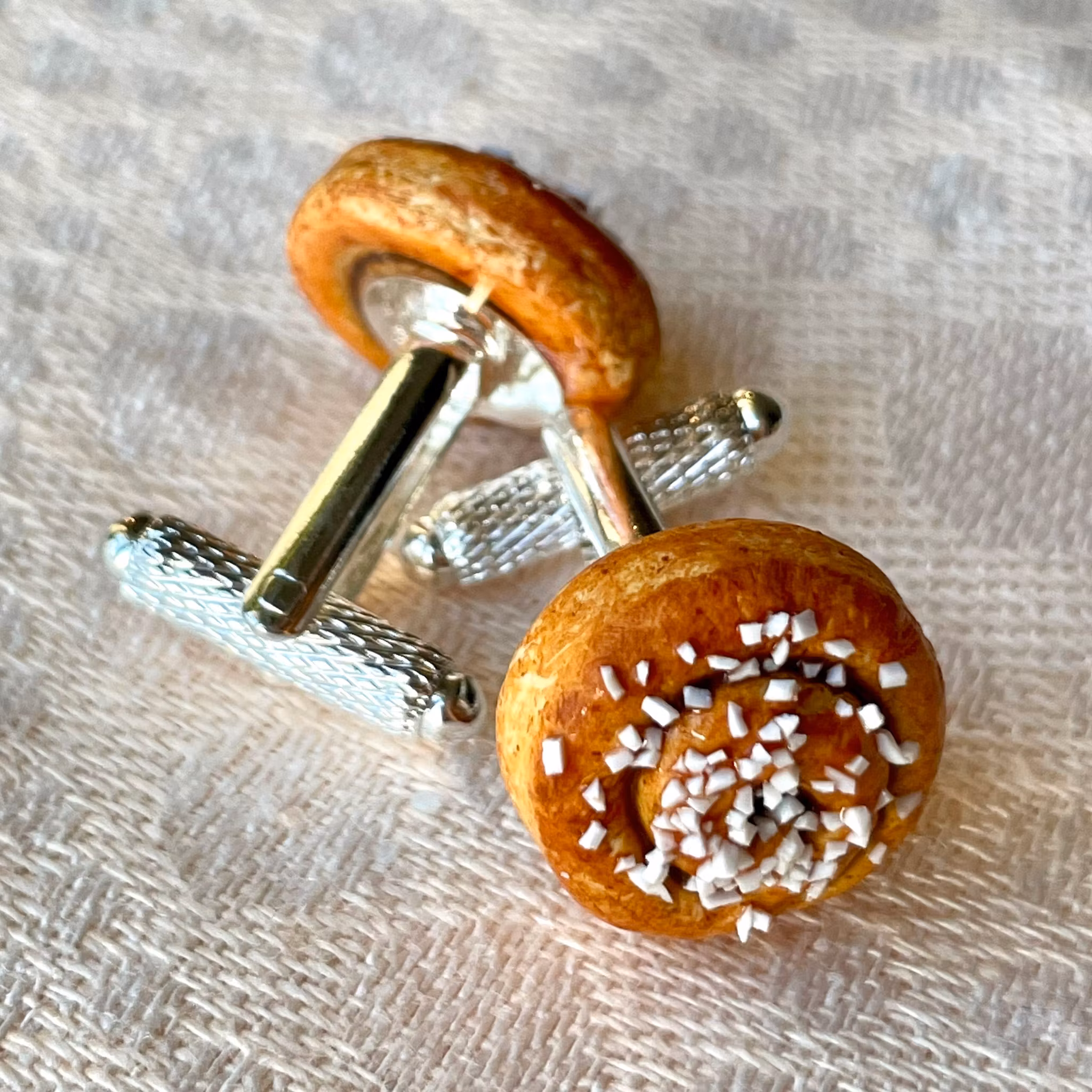 Kanelbulle manschettknappar
