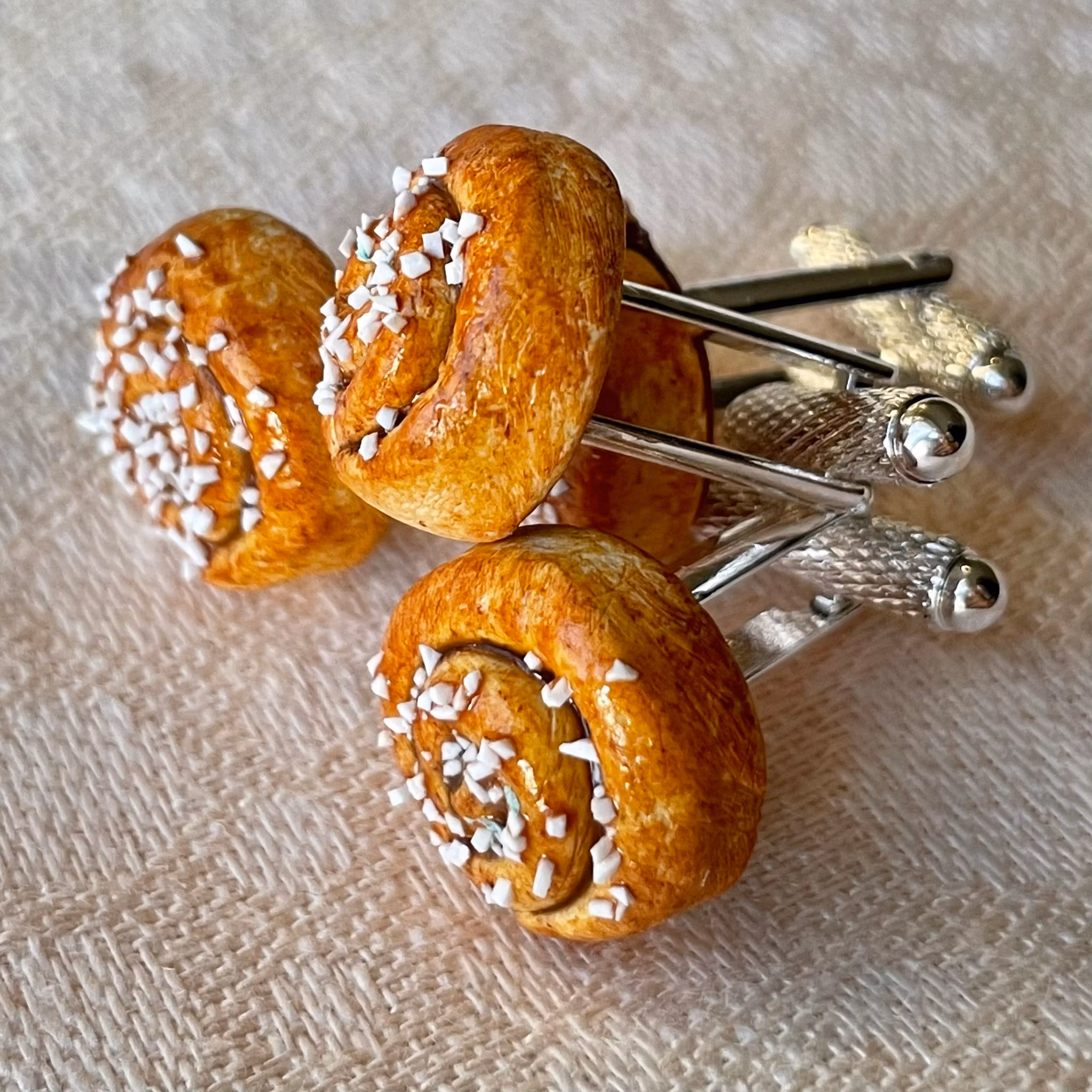 Kanelbulle manschettknappar