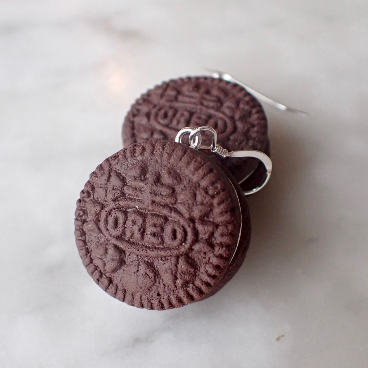 Oreo örhängen silver/guld 1 par
