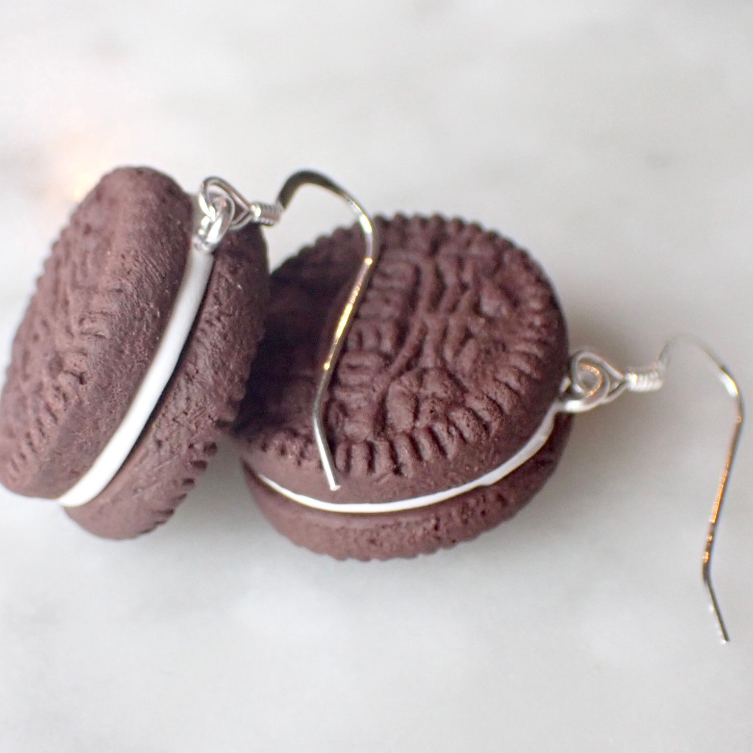 Oreo örhängen silver/guld 1 par
