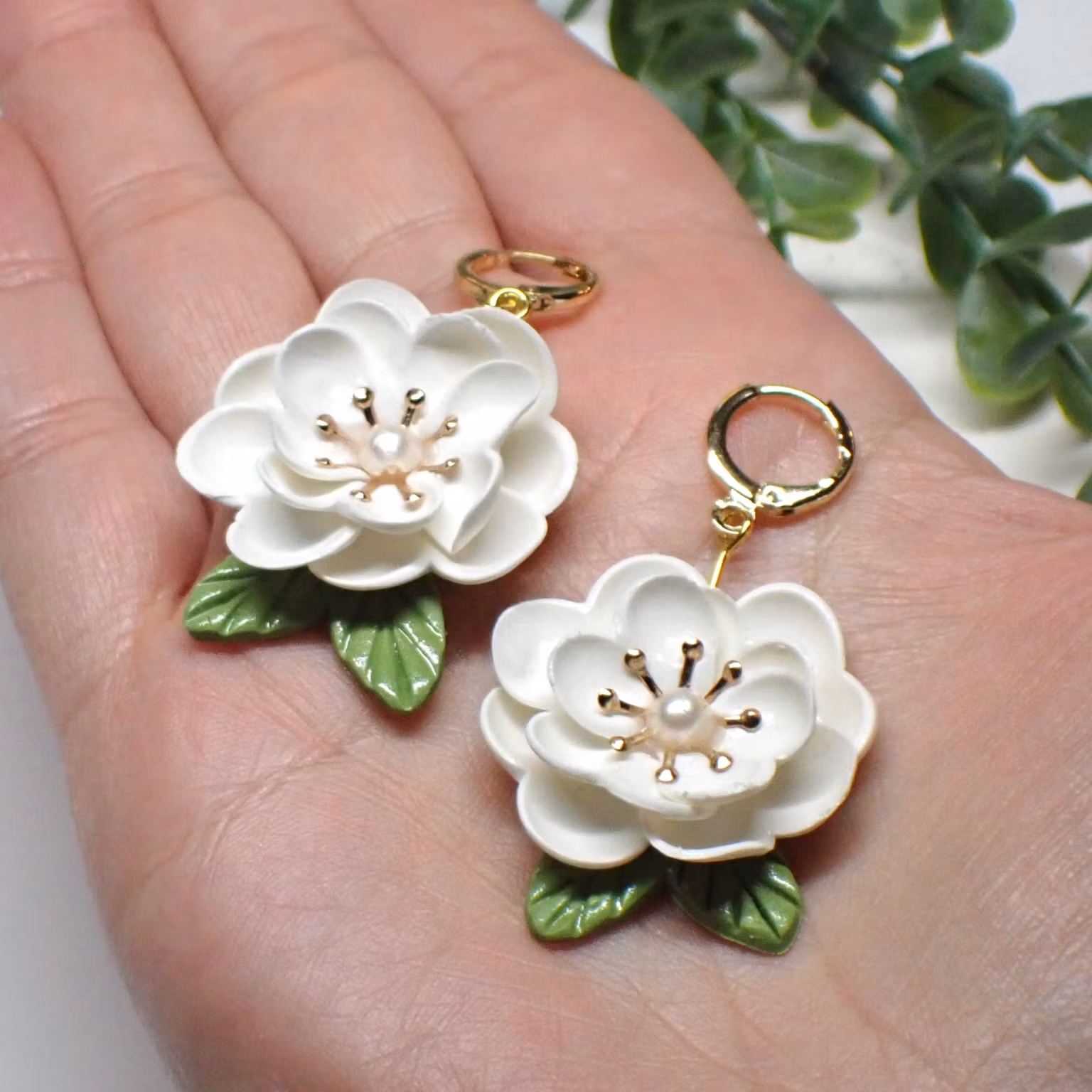 Magnolia vita guld/silver
