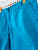 Bermudas i teal