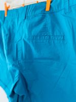 Bermudas i teal
