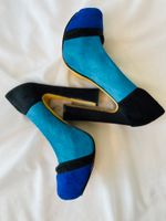 Blockfärgade pumps
