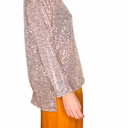 Topp med guldpaljetter