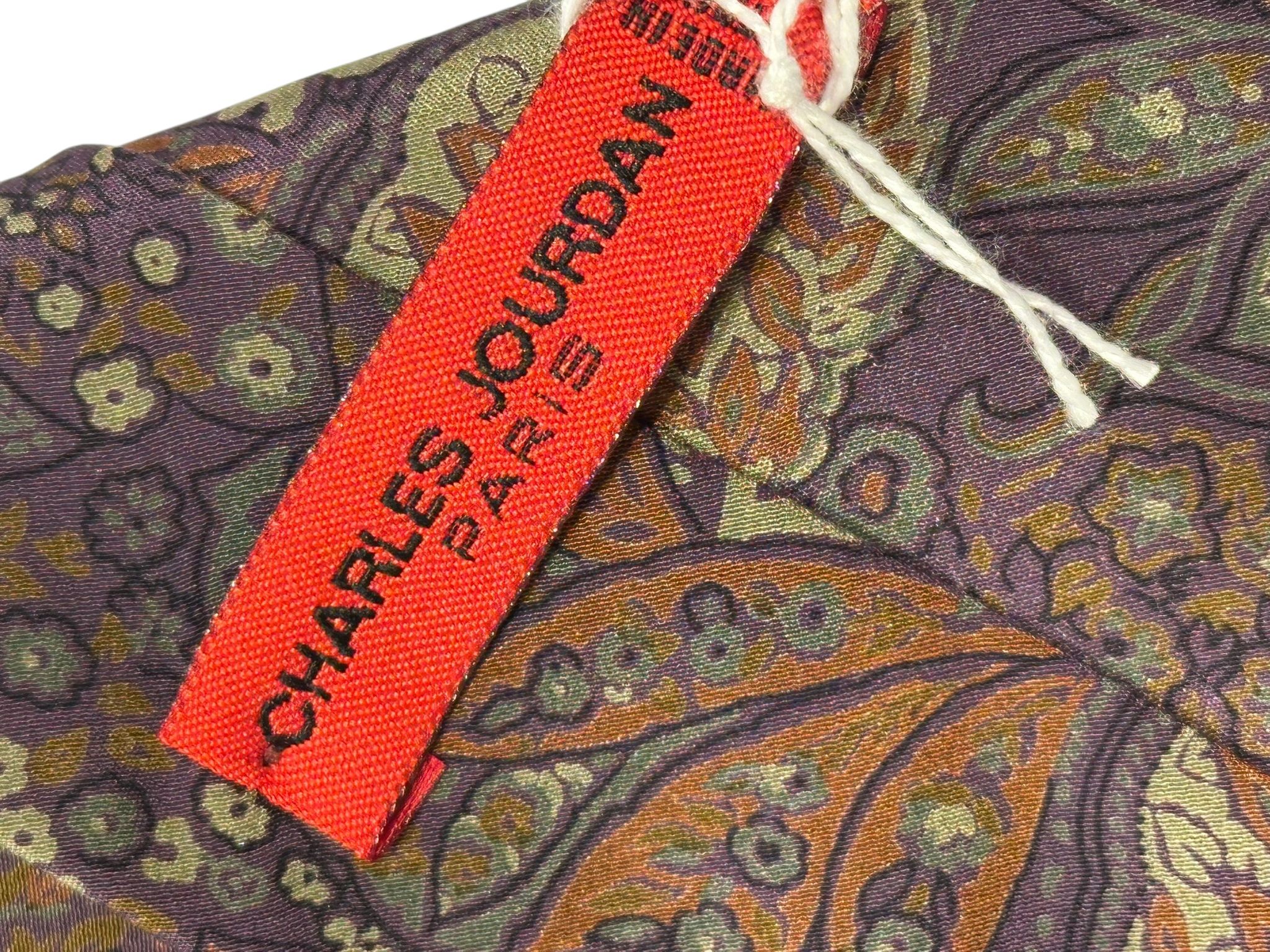 Charles Jourdan slips i siden