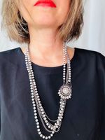 Pärlhalsband i flera rader
