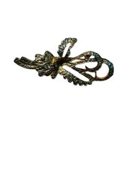 Brosch med strass och rosett