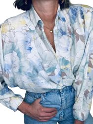 Vintage blus med markerade axlar