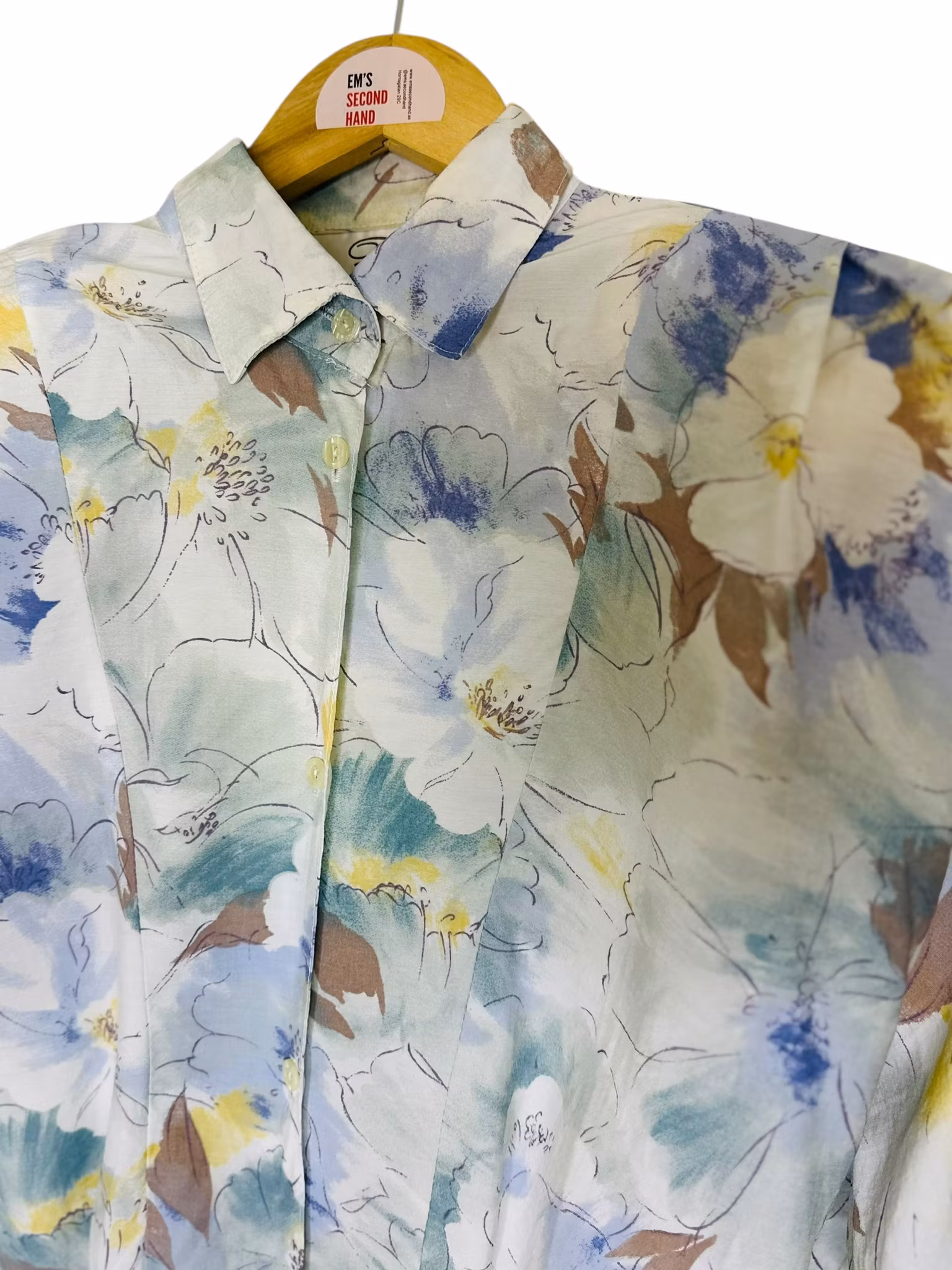 Vintage blus med markerade axlar