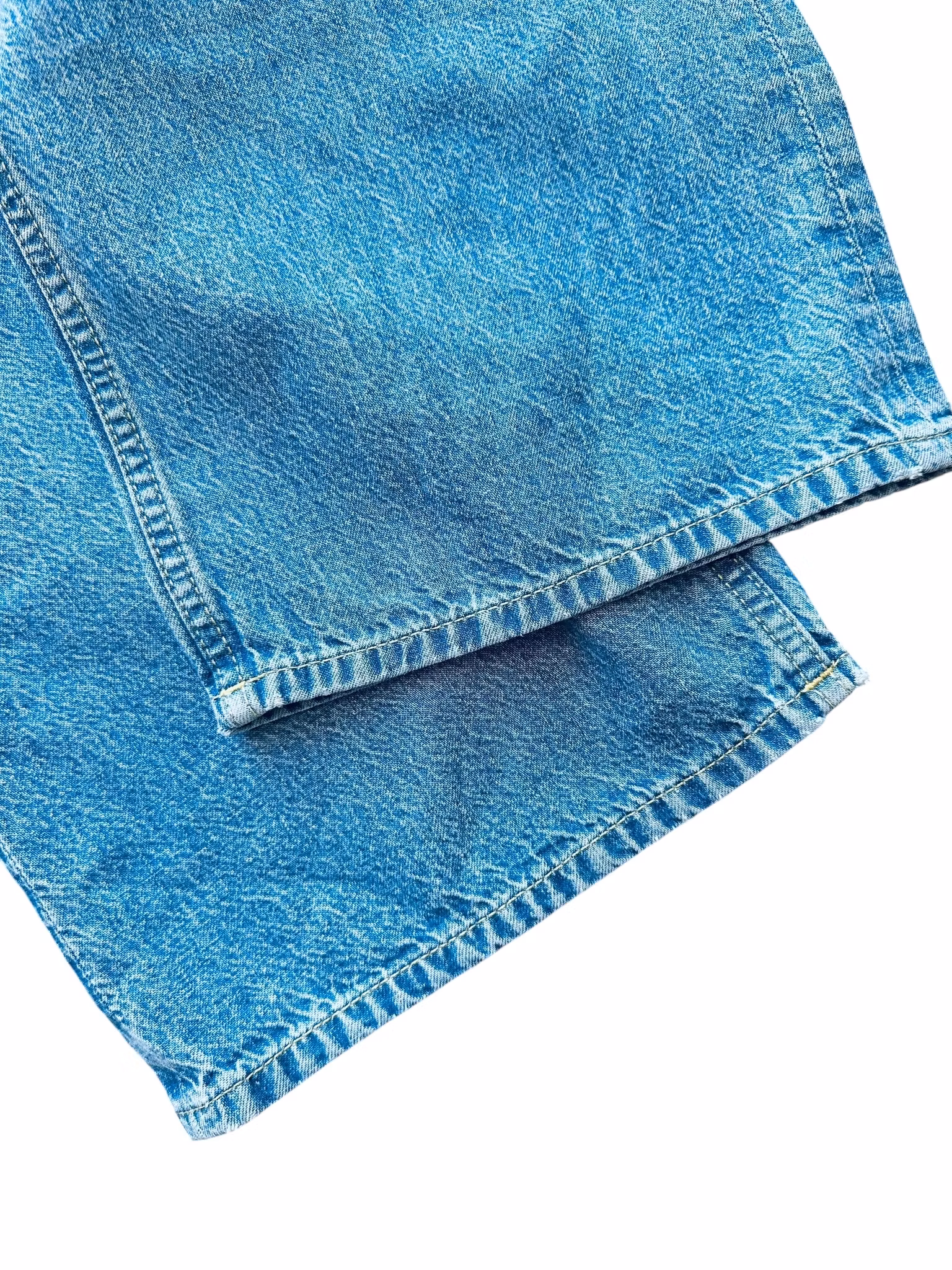Jeans med flätad midja