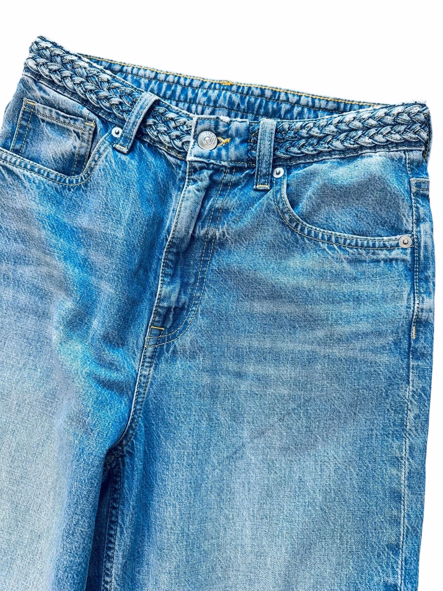 Jeans med flätad midja