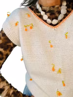 Hemstickad slipover med 3D-blommor