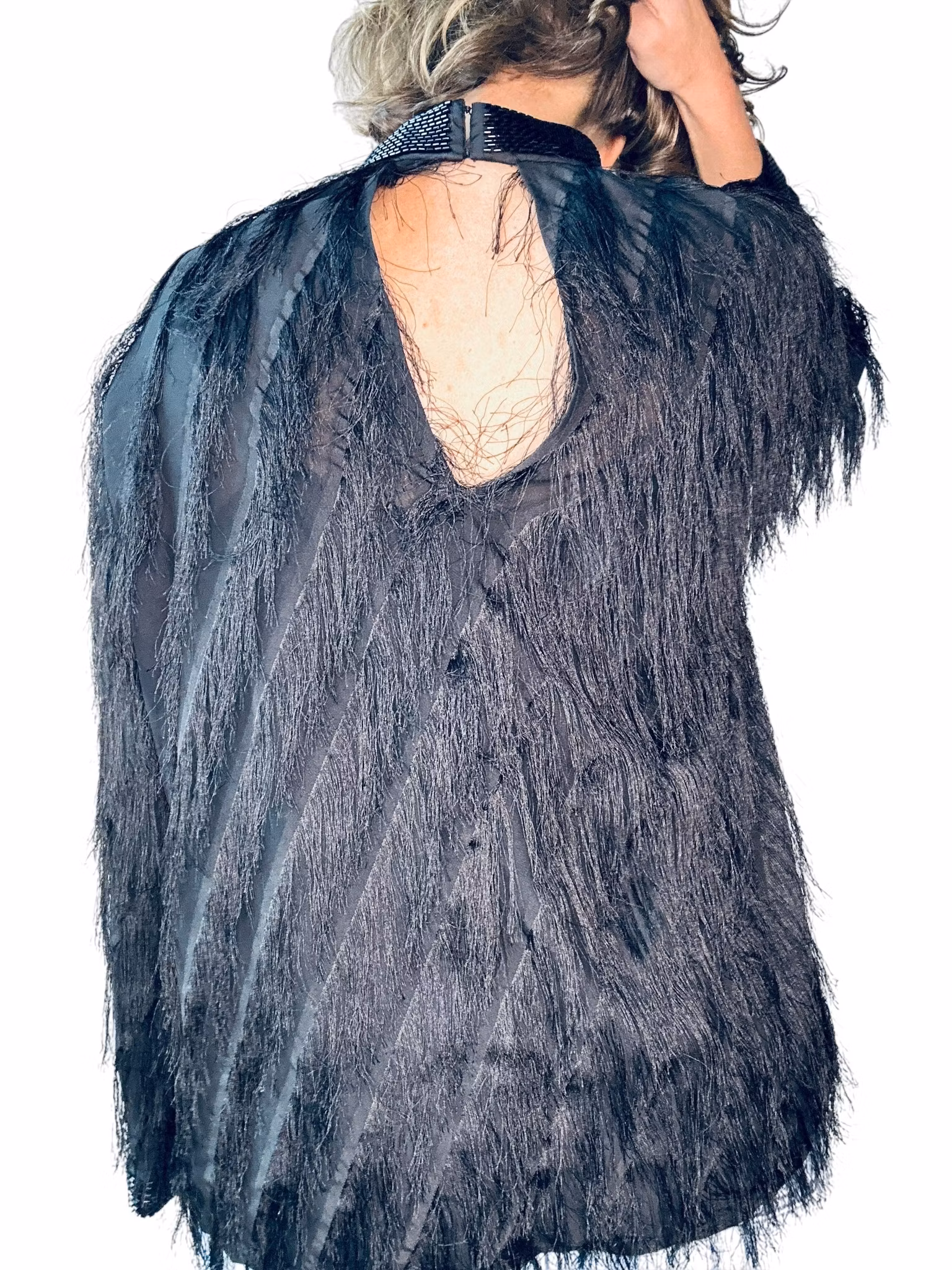 Fransig topp med pärlade detaljer