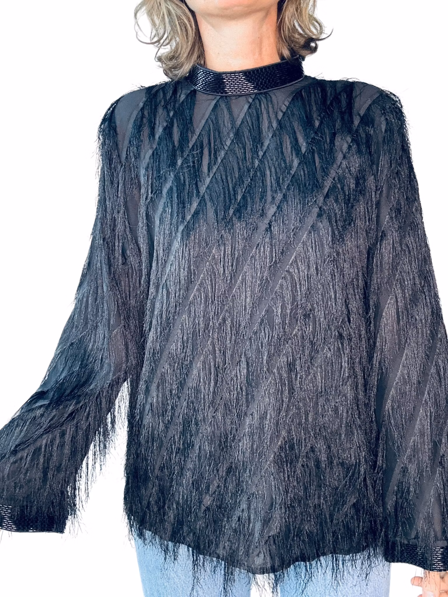 Fransig topp med pärlade detaljer