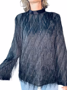 Fransig topp med pärlade detaljer