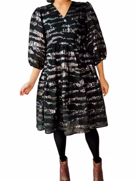 Puffig klänning i sidenmix