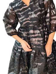 Puffig klänning i sidenmix