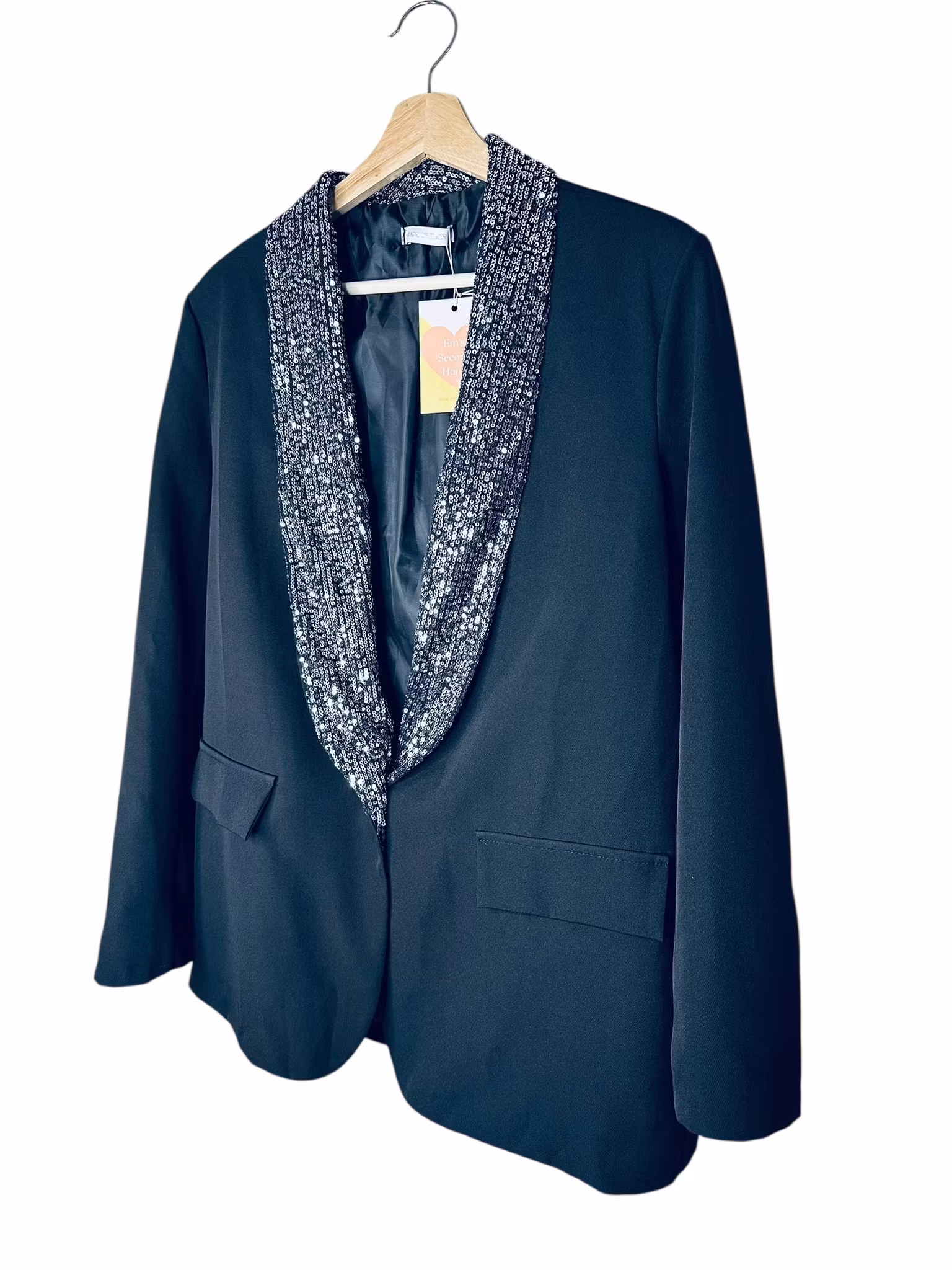 Svart kavaj med paljettslag