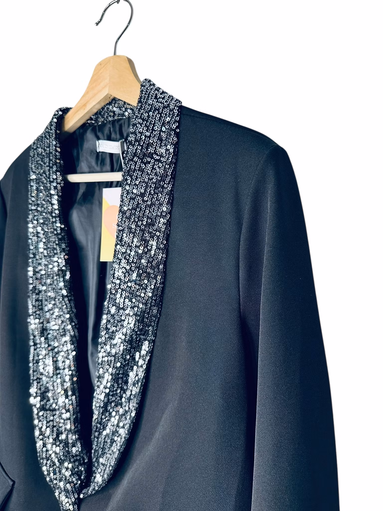 Svart kavaj med paljettslag