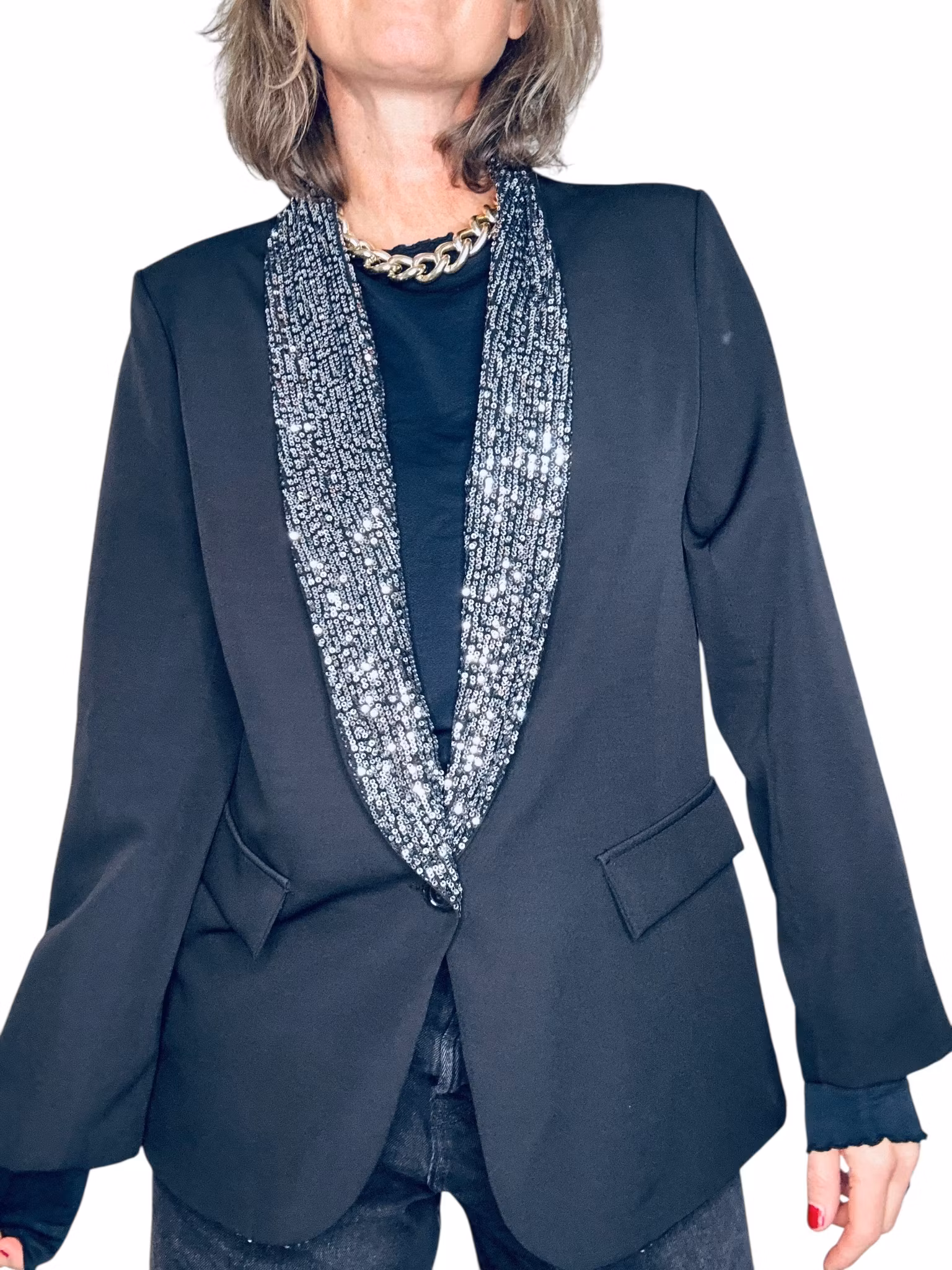 Svart kavaj med paljettslag