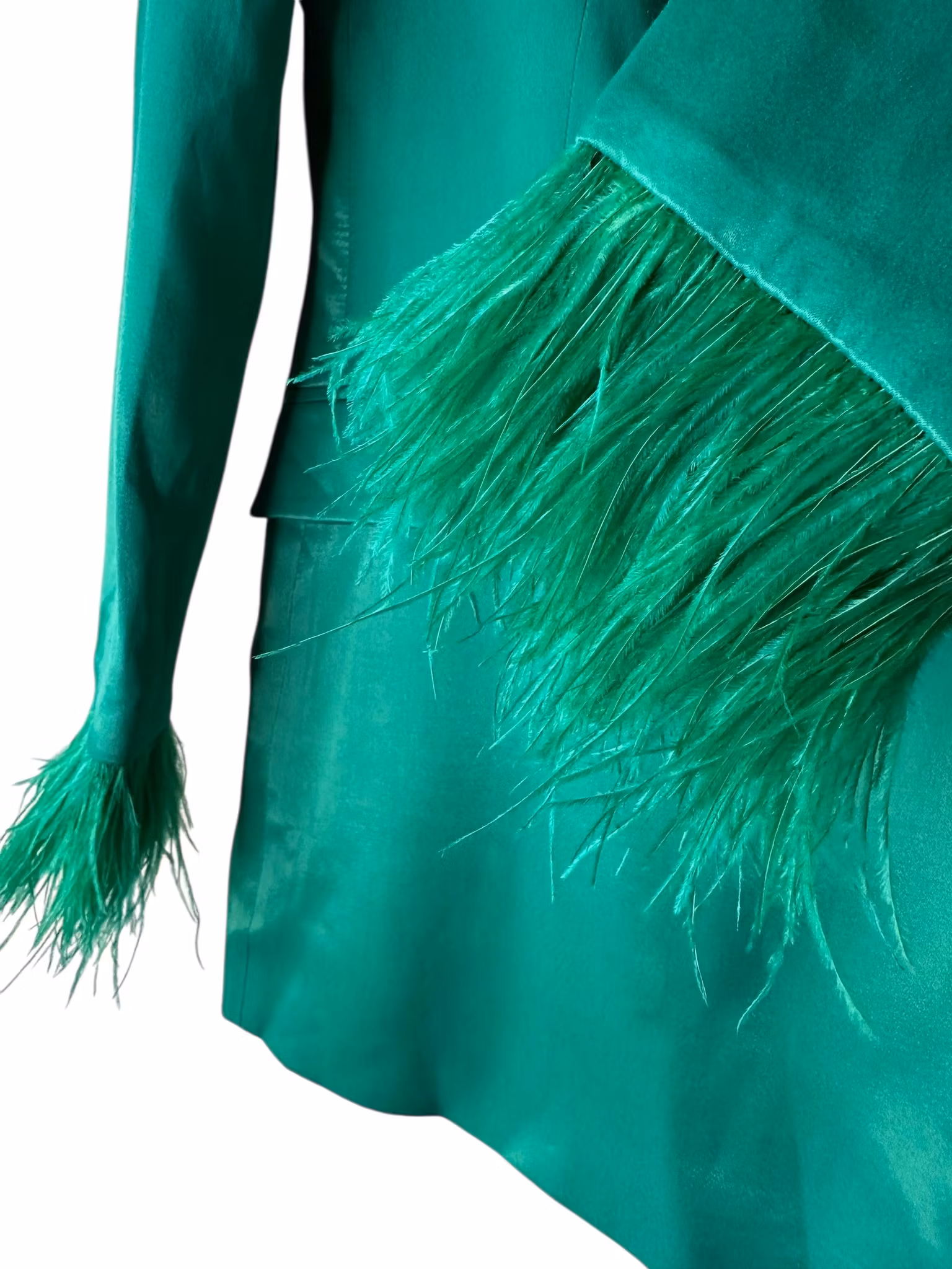 Grön kavaj med fjädrar