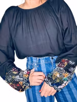 Rodebjer topp med paljettärmar