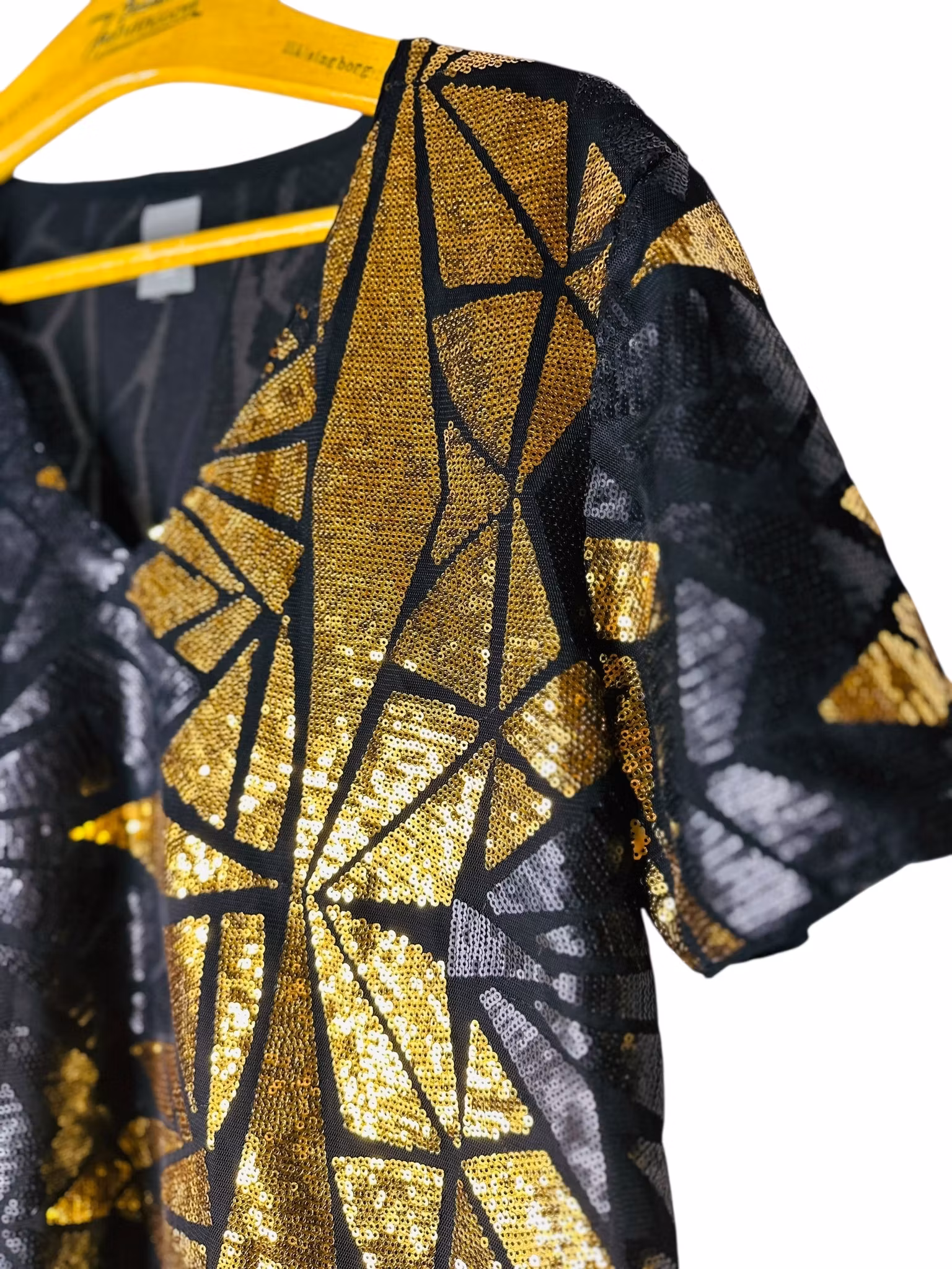 Paljett-topp i svart och guld