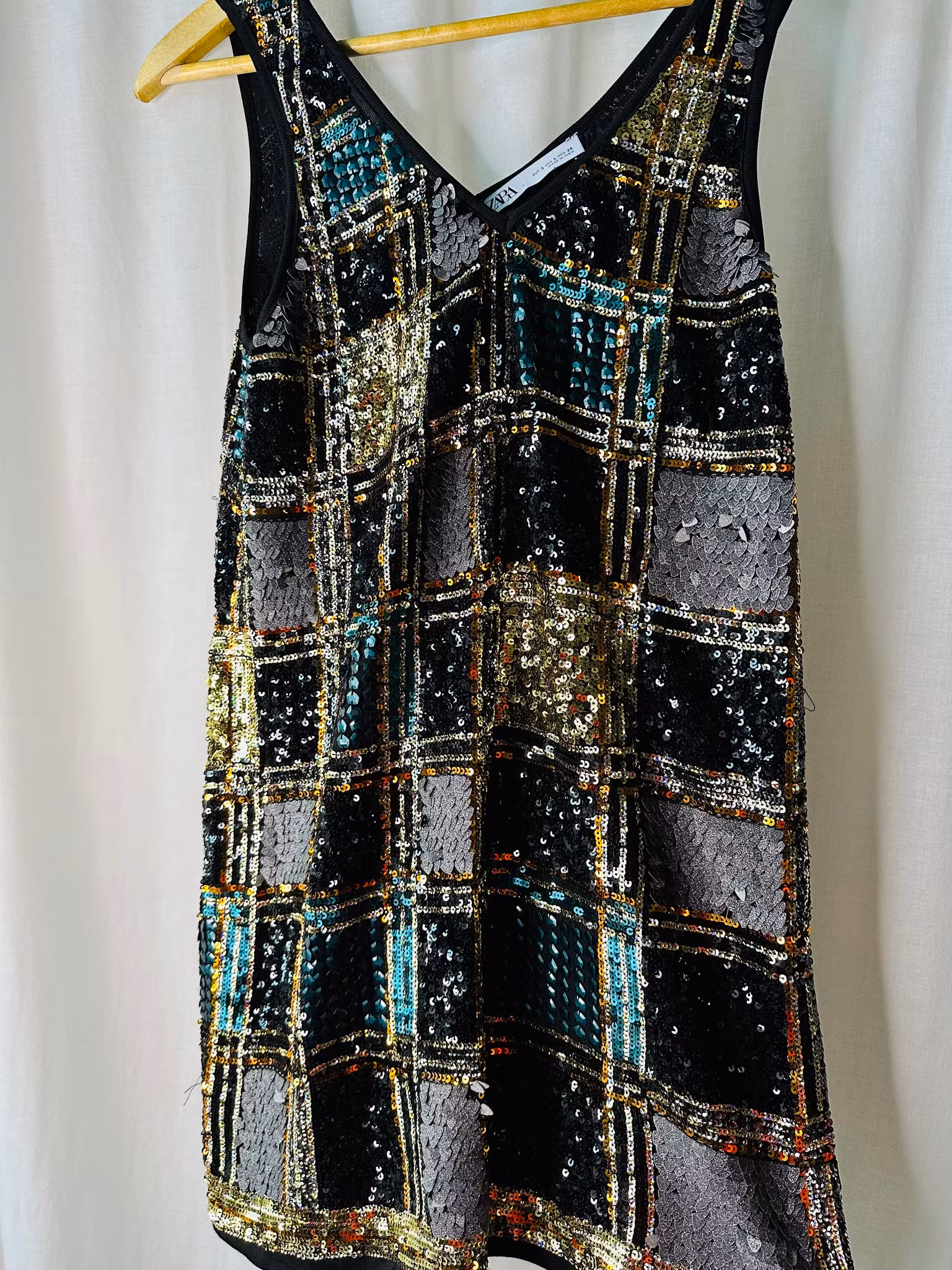 Rutig paljettklänning