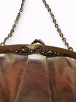 Vintage guldfärgad väska