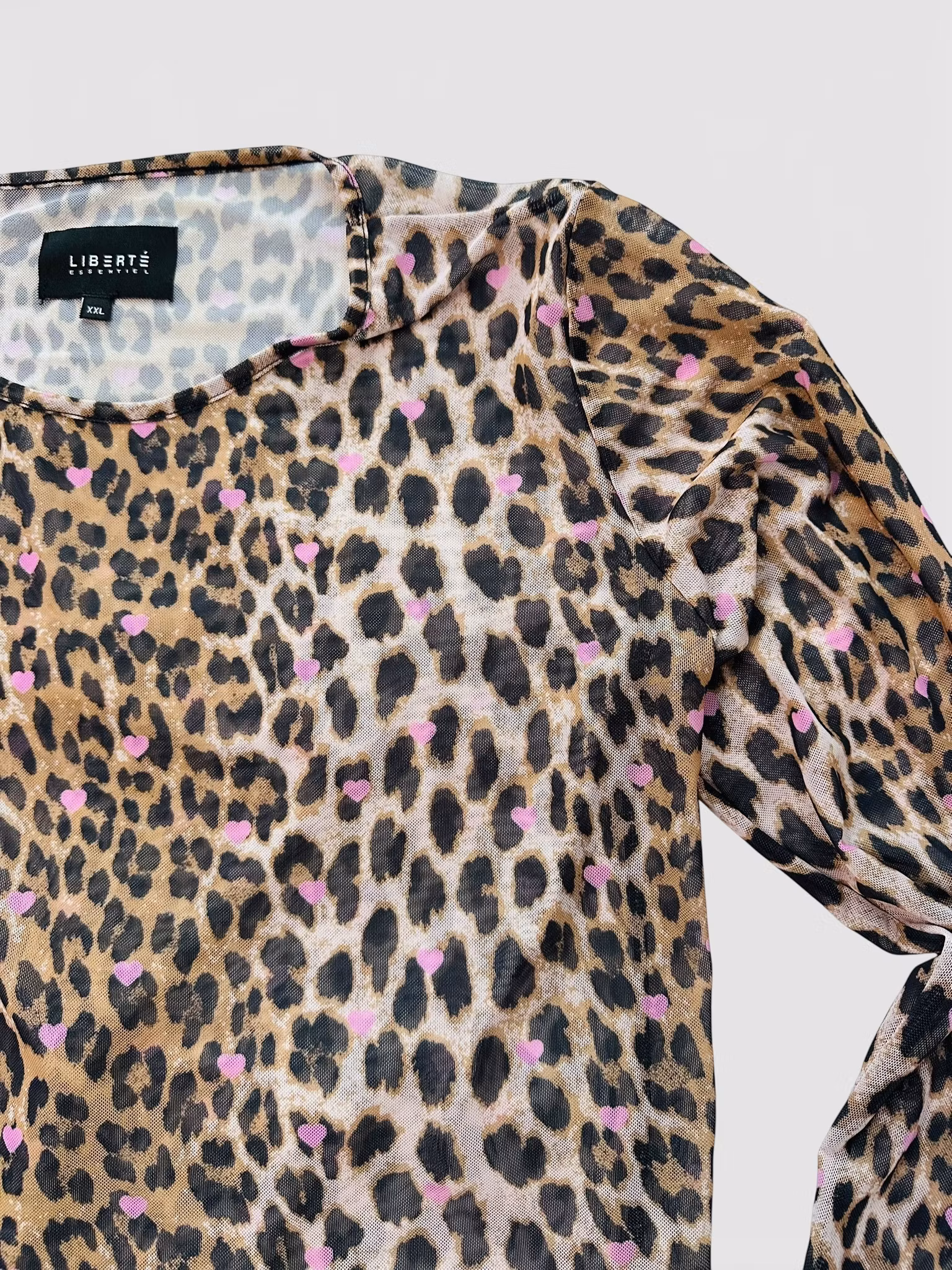 Meshtröja: leomönstrad med rosa hjärtan