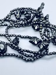 Oxiderad kedja med många berlocker