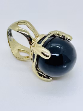 Ring med stor svart kula