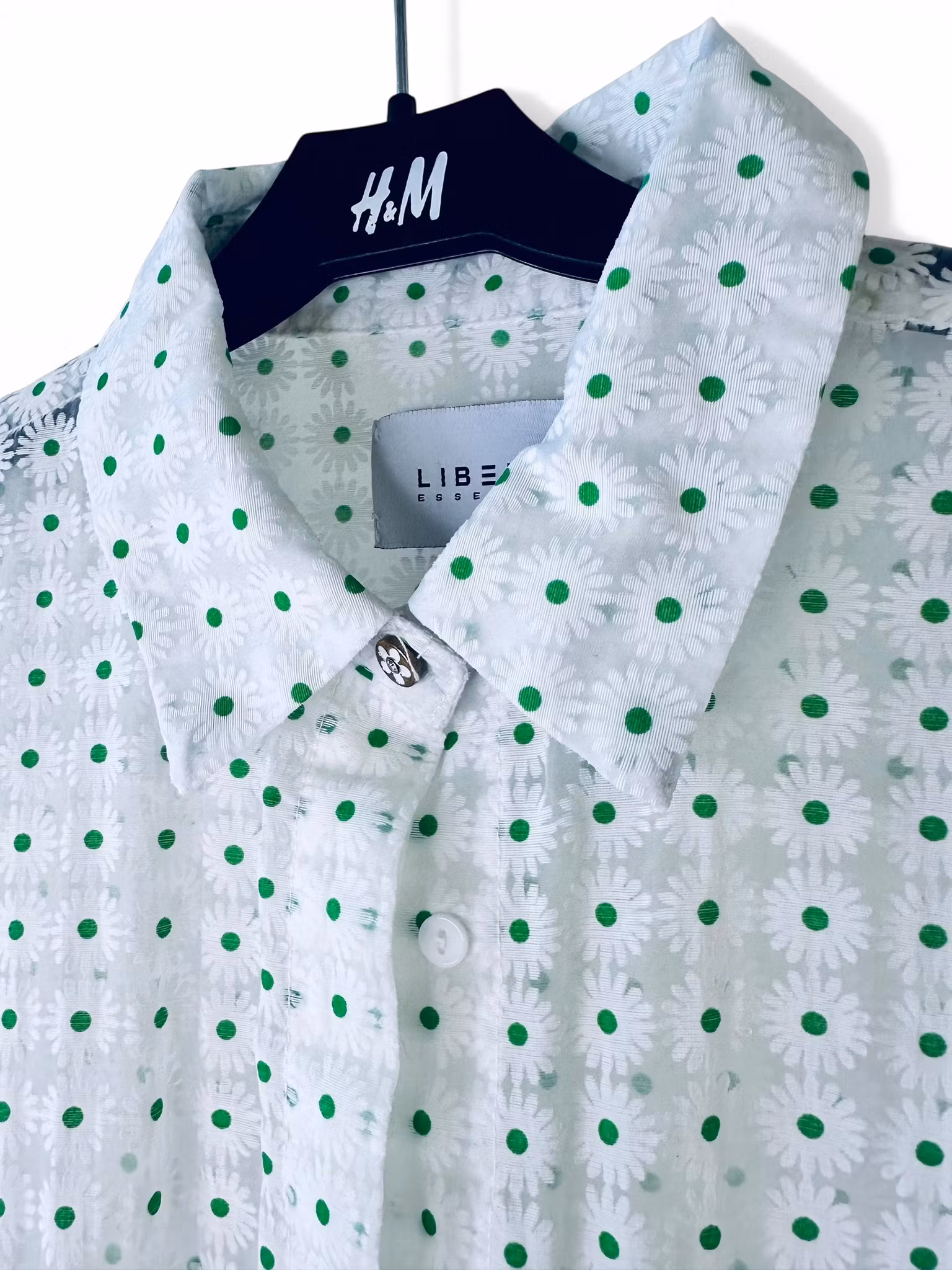 Transparent blommig blus med puffärm