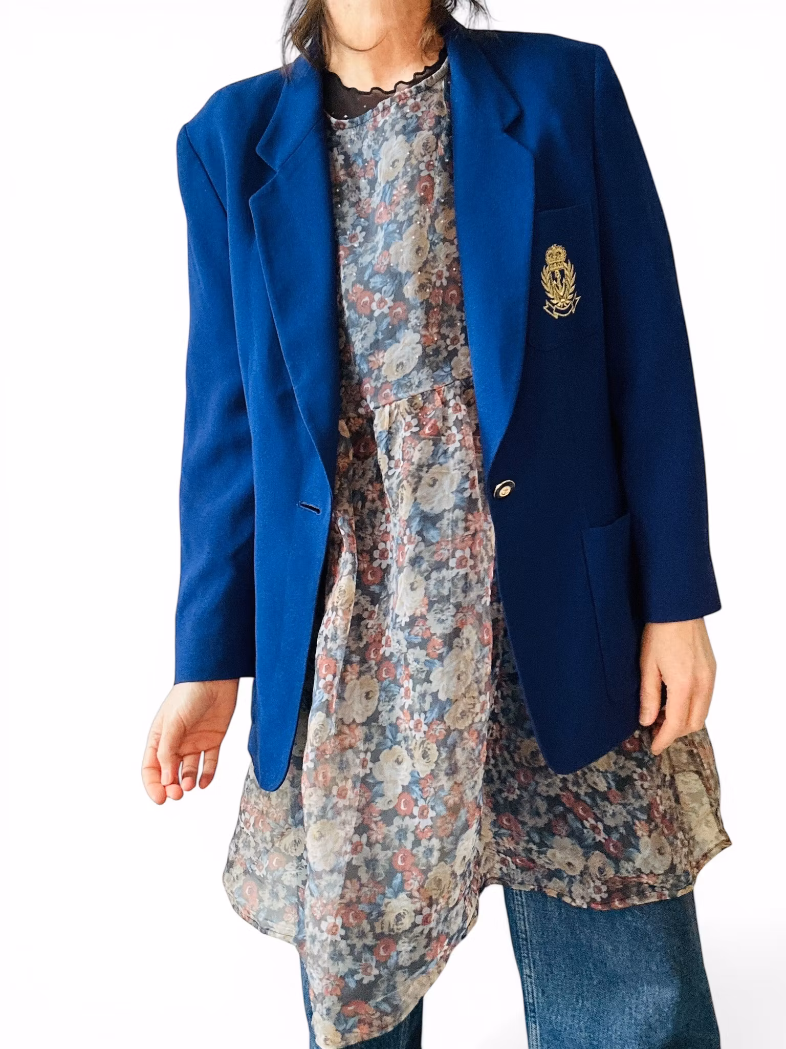 Blå kavaj med emblem