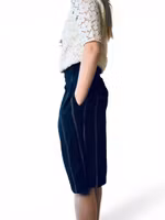 Långa dressade shorts