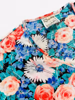 Vintage blommig tisha