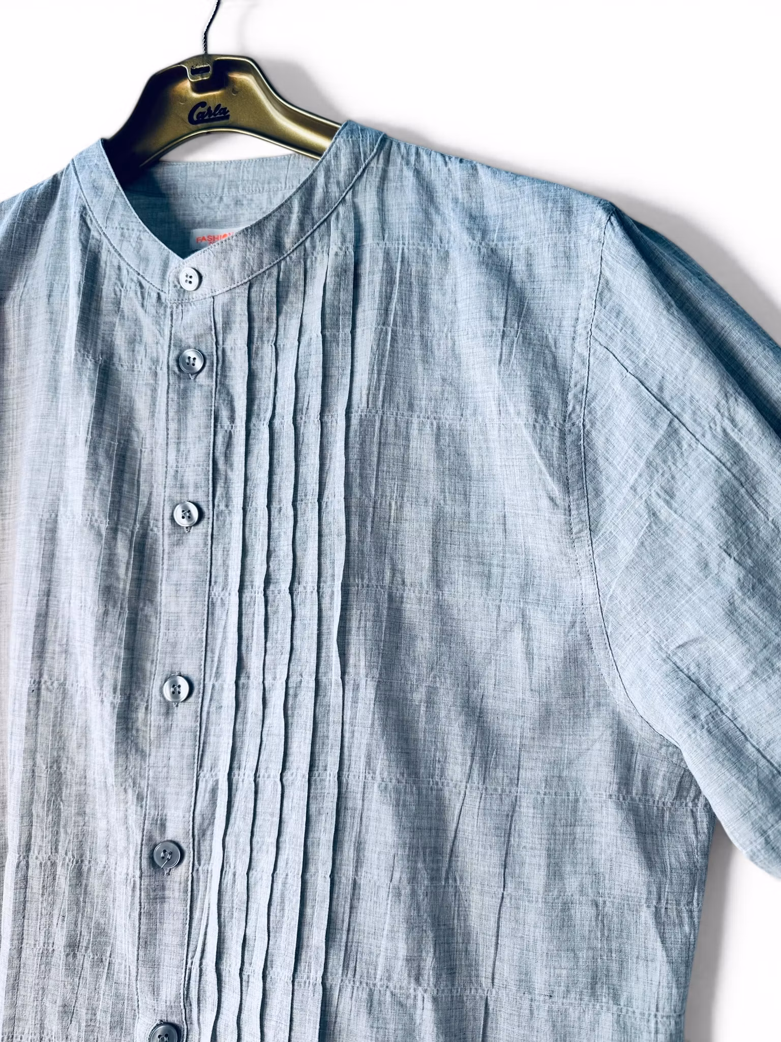 Gråmelerad skjorta med sotarkrage